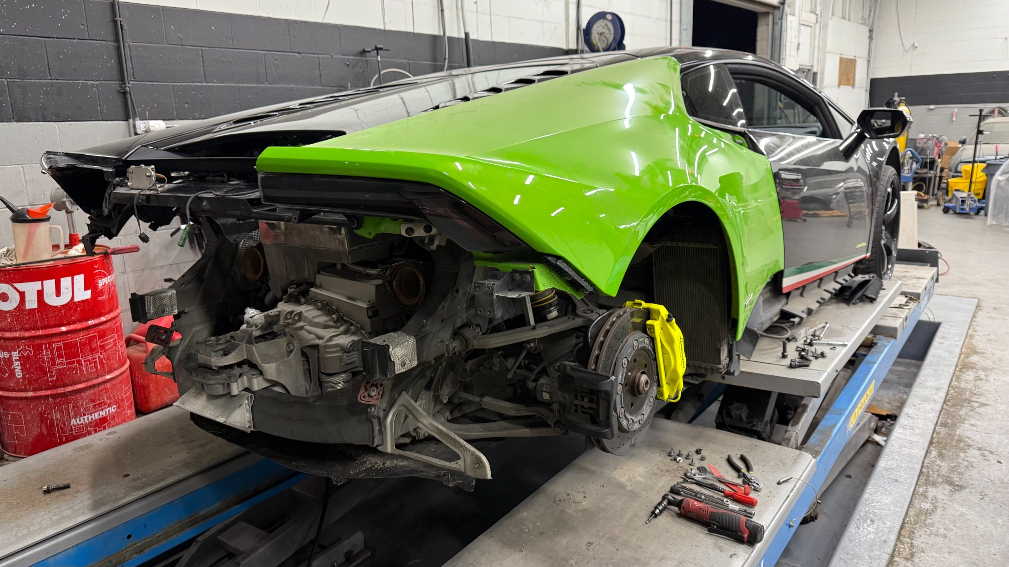 Verde Mantis rear quarter panel during bodywork fitting.
